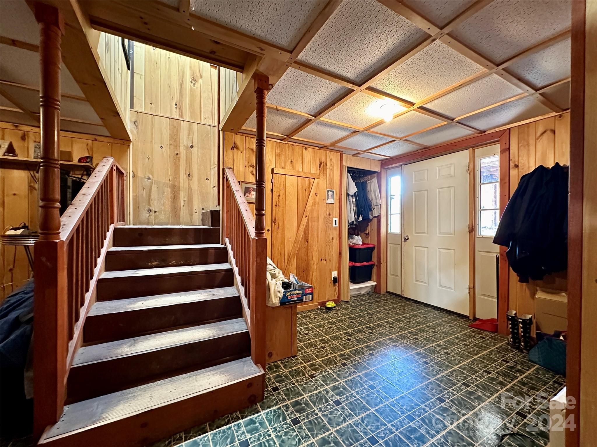 4453 Scott Road Morganton, NC 28655 - Photo 31 of 44 a view of entryway with wooden floor and stairs