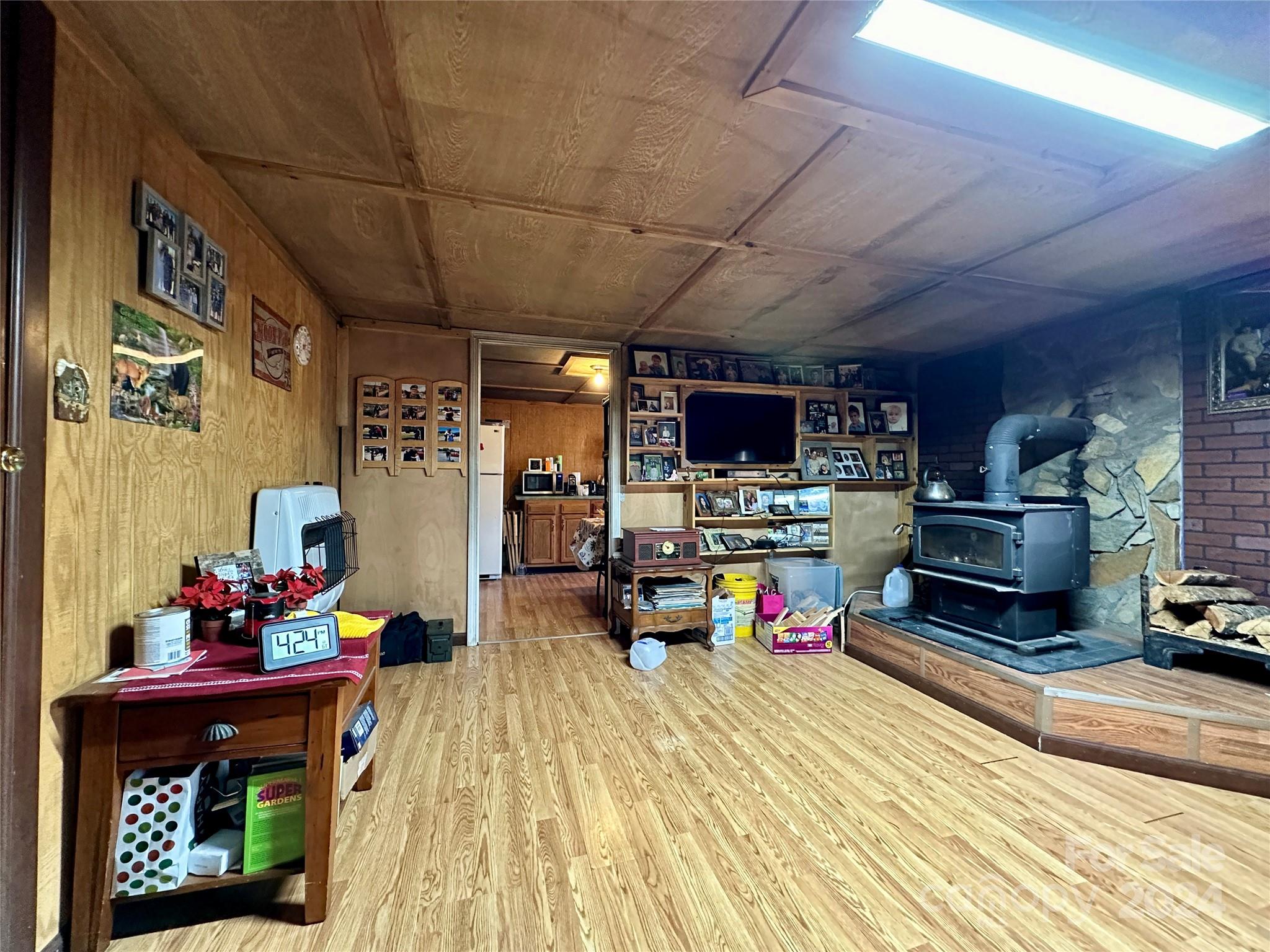 4453 Scott Road Morganton, NC 28655 - Photo 39 of 44 a living room with lots of furniture and a flat screen tv
