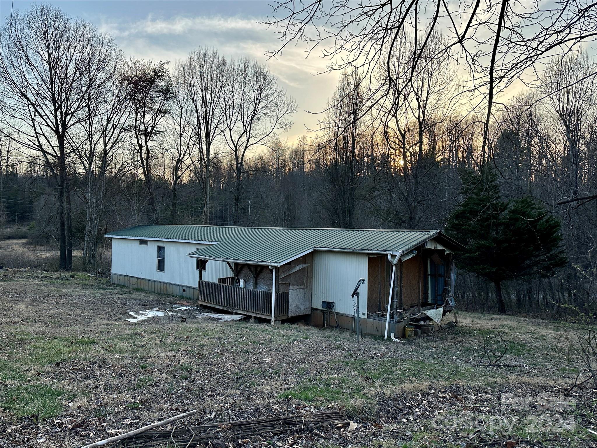 4453 Scott Road Morganton, NC 28655 - Photo 44 of 44 a view of a house with a yard and tree s