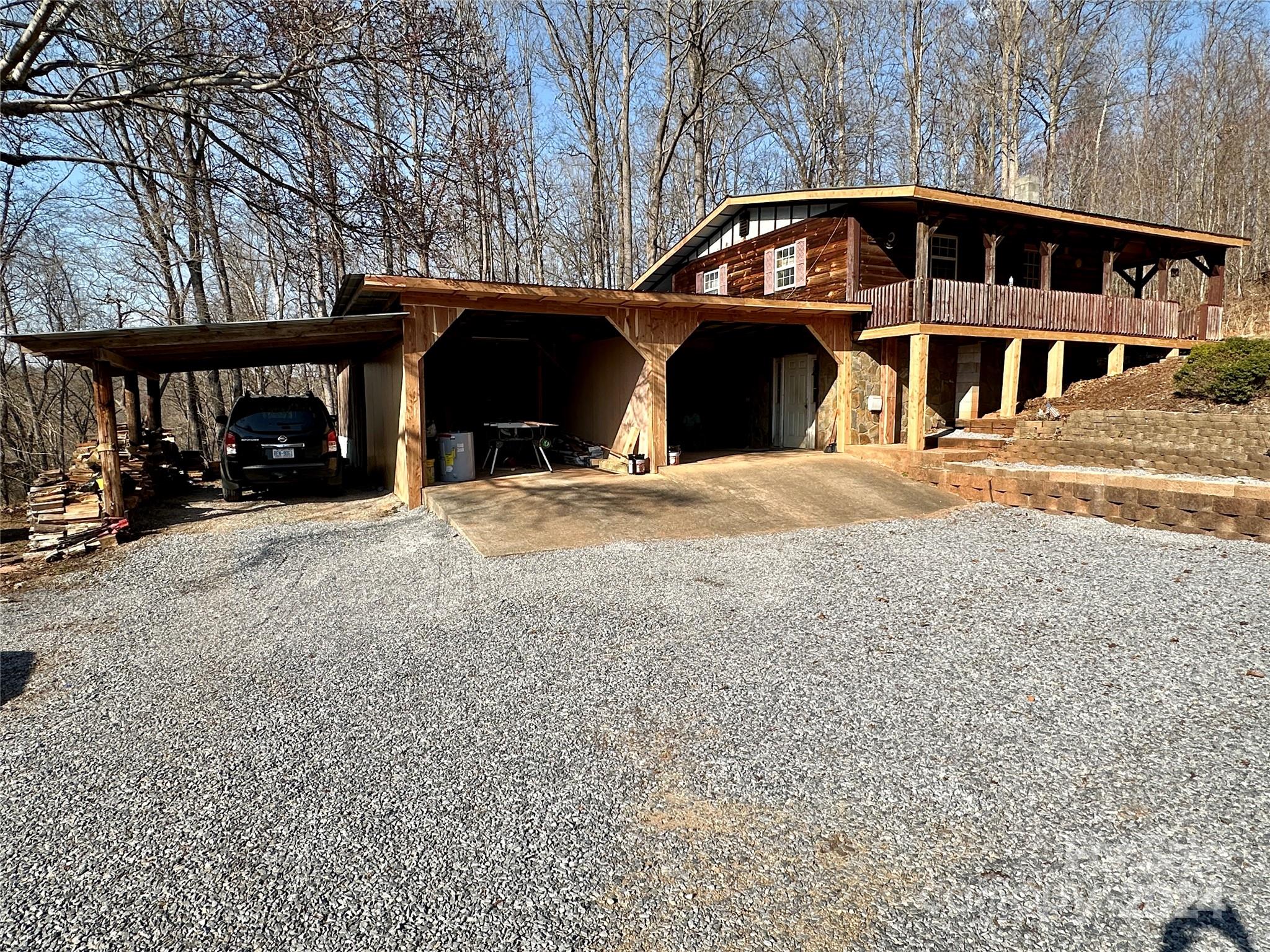 4453 Scott Road Morganton, NC 28655 - Photo 6 of 44 a front view of a house with a yard