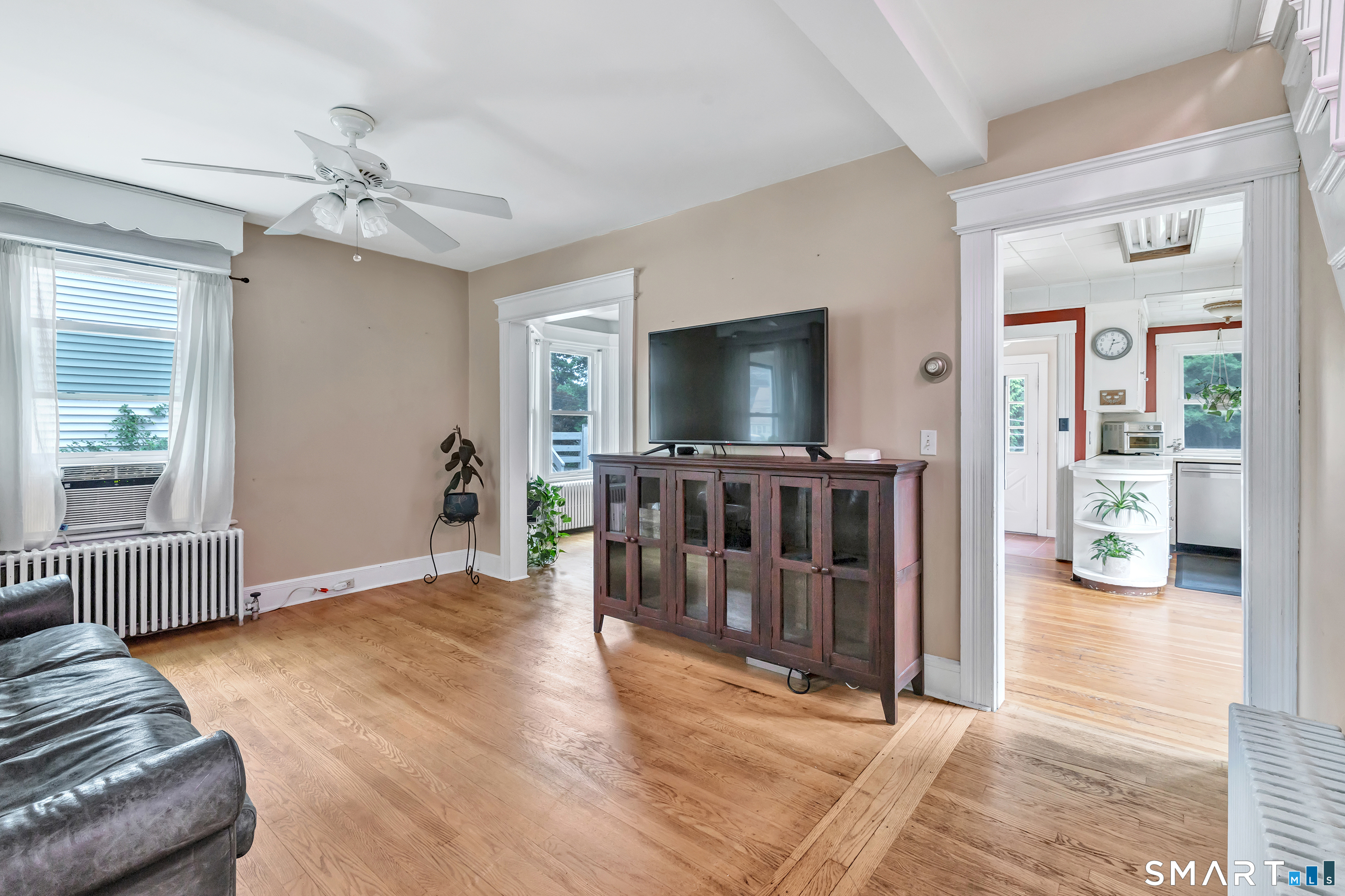 1326 Huntington Road Stratford, CT 06614 - Photo 7 of 37 Main Floor - Living Room has Hardwood Floors, lots of natural sunlight during the day.