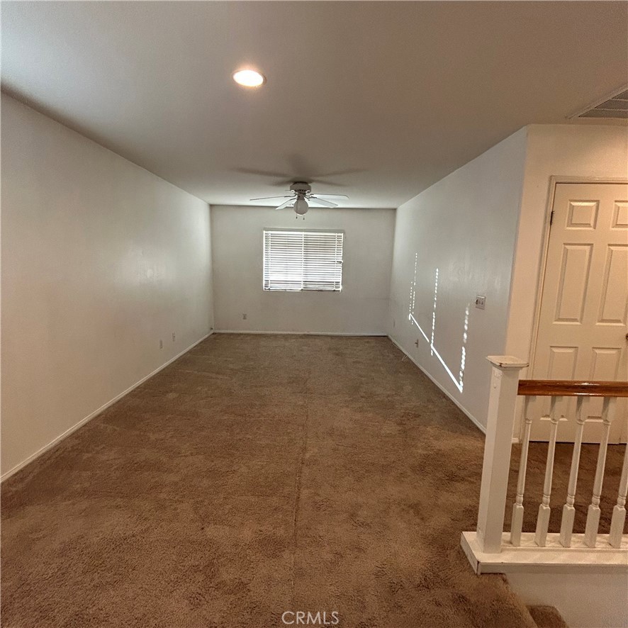 1538 Apple Canyon Road Beaumont, CA 92223 - Photo 11 of 23 an empty room with windows