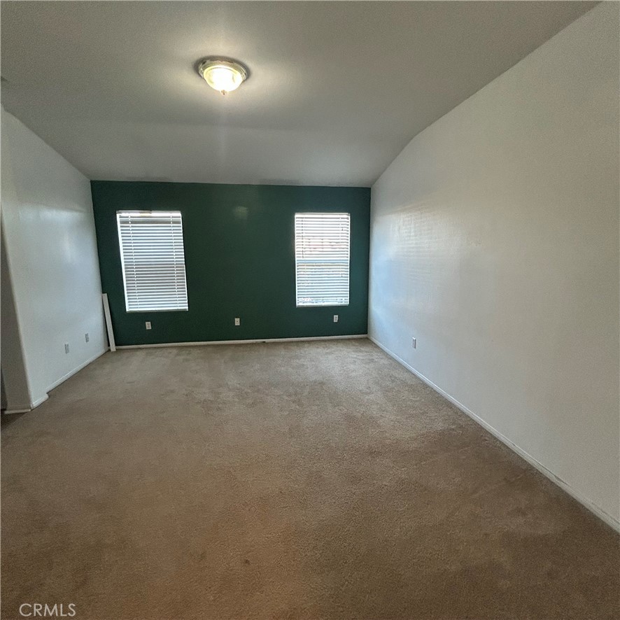 1538 Apple Canyon Road Beaumont, CA 92223 - Photo 12 of 23 an empty room with windows
