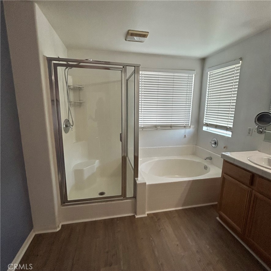 1538 Apple Canyon Road Beaumont, CA 92223 - Photo 14 of 23 a bathroom with a bathtub and a shower