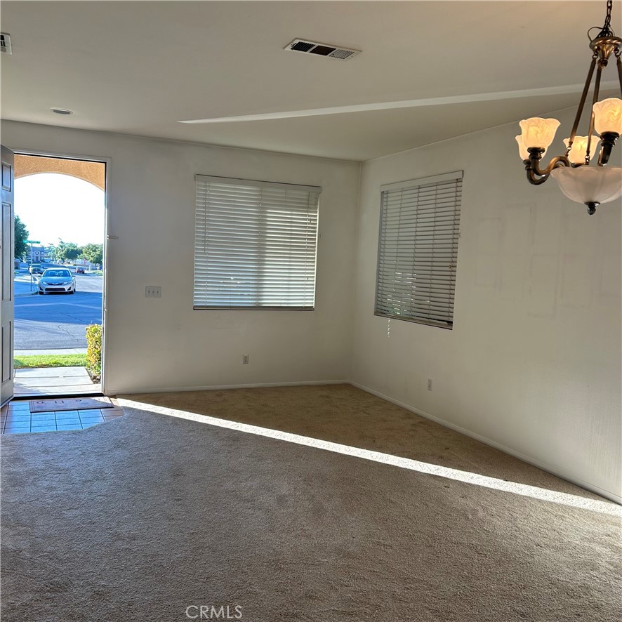 1538 Apple Canyon Road Beaumont, CA 92223 - Photo 2 of 23 en empty room with windows