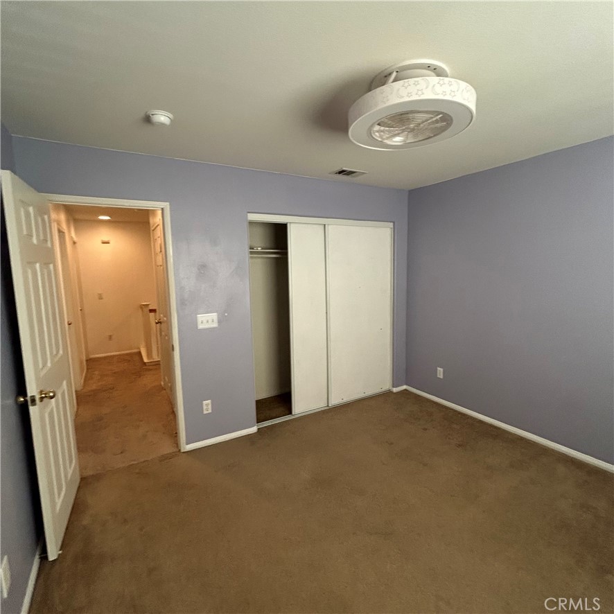 1538 Apple Canyon Road Beaumont, CA 92223 - Photo 21 of 23 an empty room with a mirror
