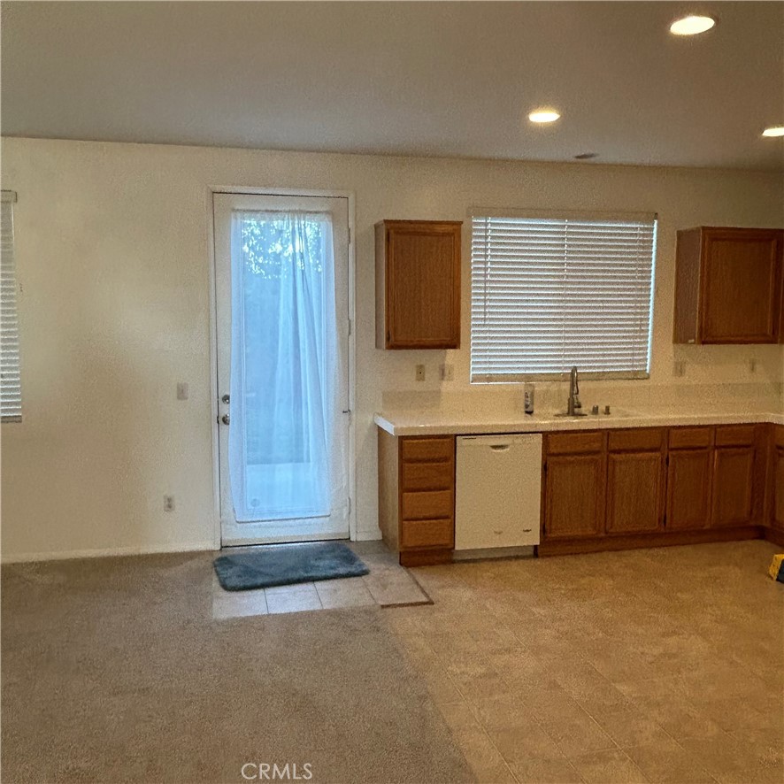 1538 Apple Canyon Road Beaumont, CA 92223 - Photo 4 of 23 a view of a kitchen with washer and dryer