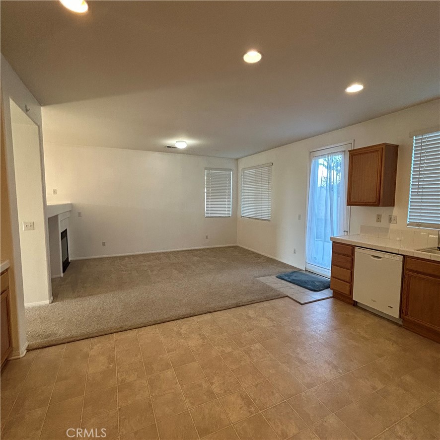 1538 Apple Canyon Road Beaumont, CA 92223 - Photo 5 of 23 a view of a kitchen with a sink and a stove top oven