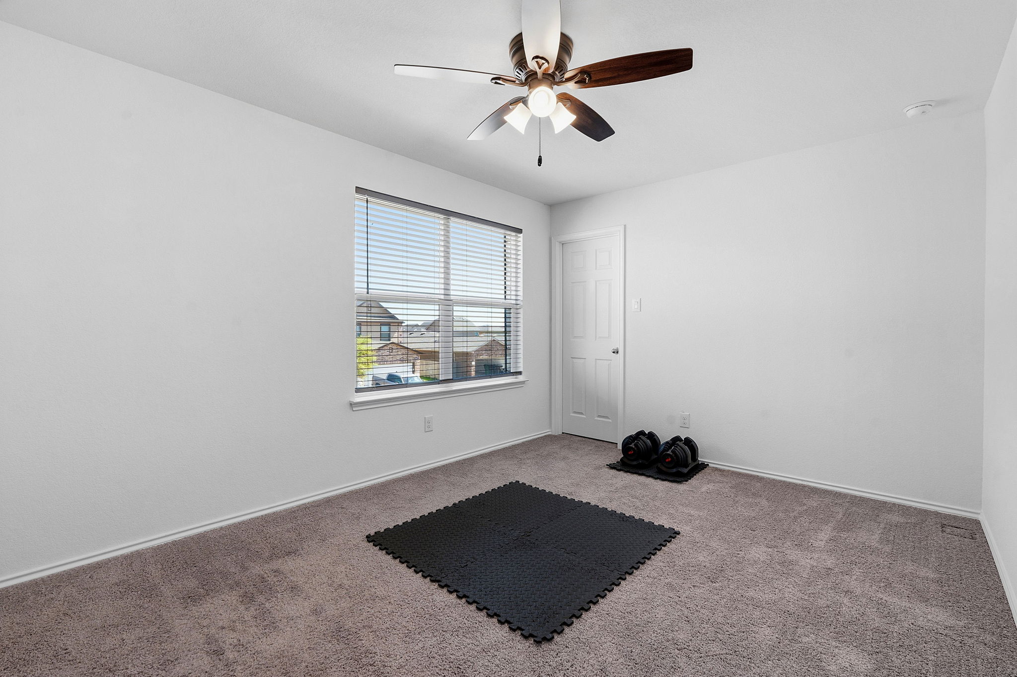 13928 Inaugural Street Manor, TX 78653 - Photo 29 of 34 Front upstairs bedroom.