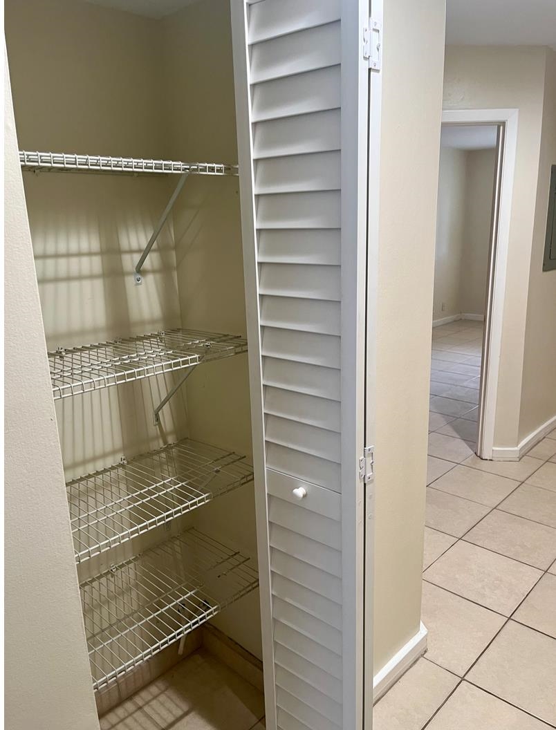 1255 Ponce Island Drive, Unit G787 St. Augustine, FL 32095 - Photo 6 of 14 a bathroom with a glass shower door