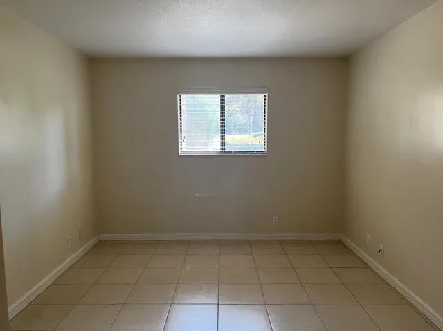 an empty room with a window