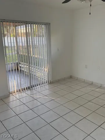 a view of wooden floor and a window
