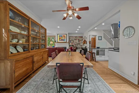 a large kitchen with a table and chairs