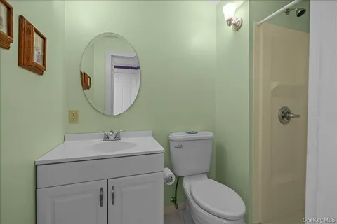 a view of backyard with outdoor seating and green space