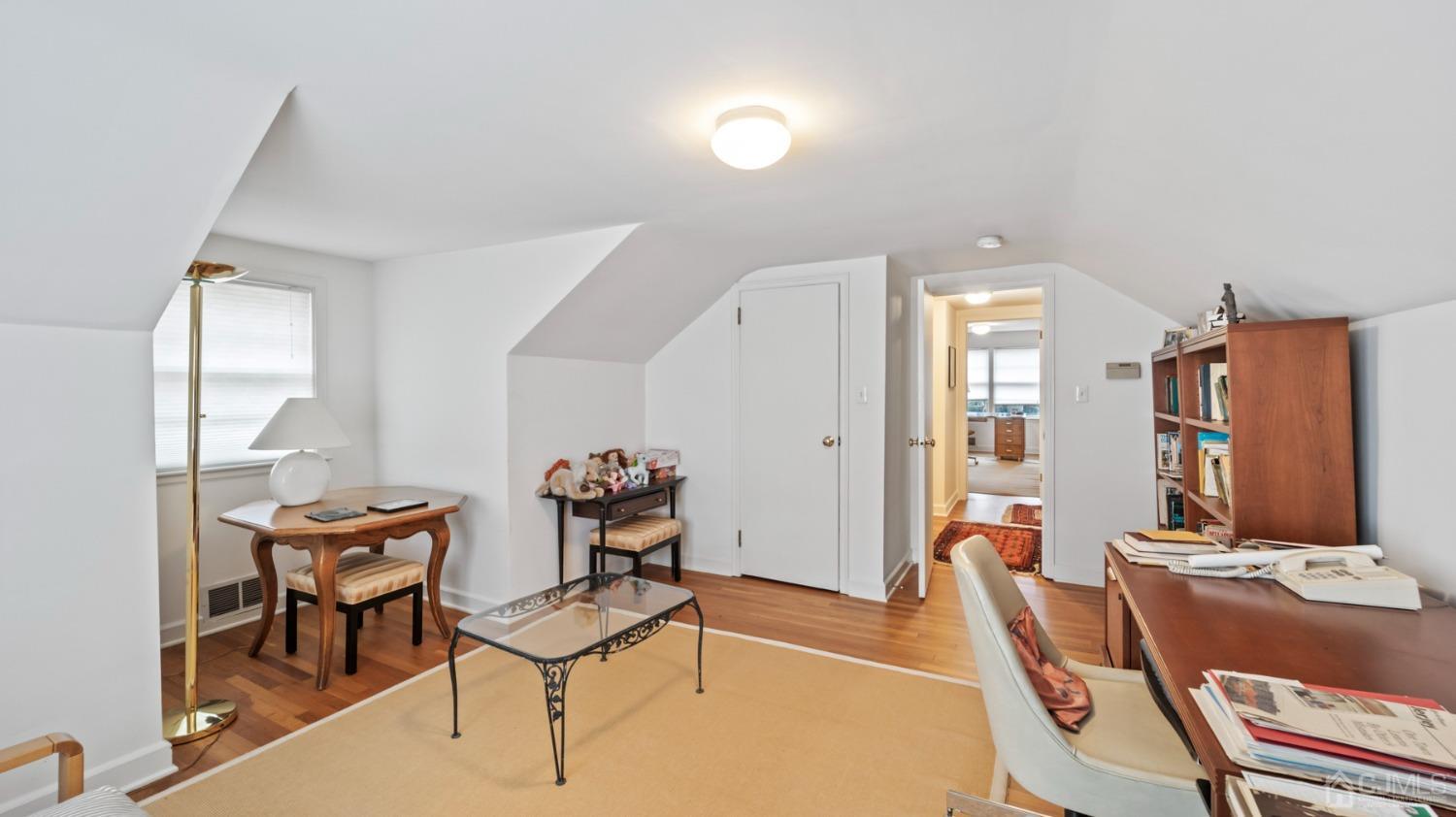 2 Beech Lane Edison, NJ 08820 - Photo 17 of 33 a room with furniture and a wooden floor