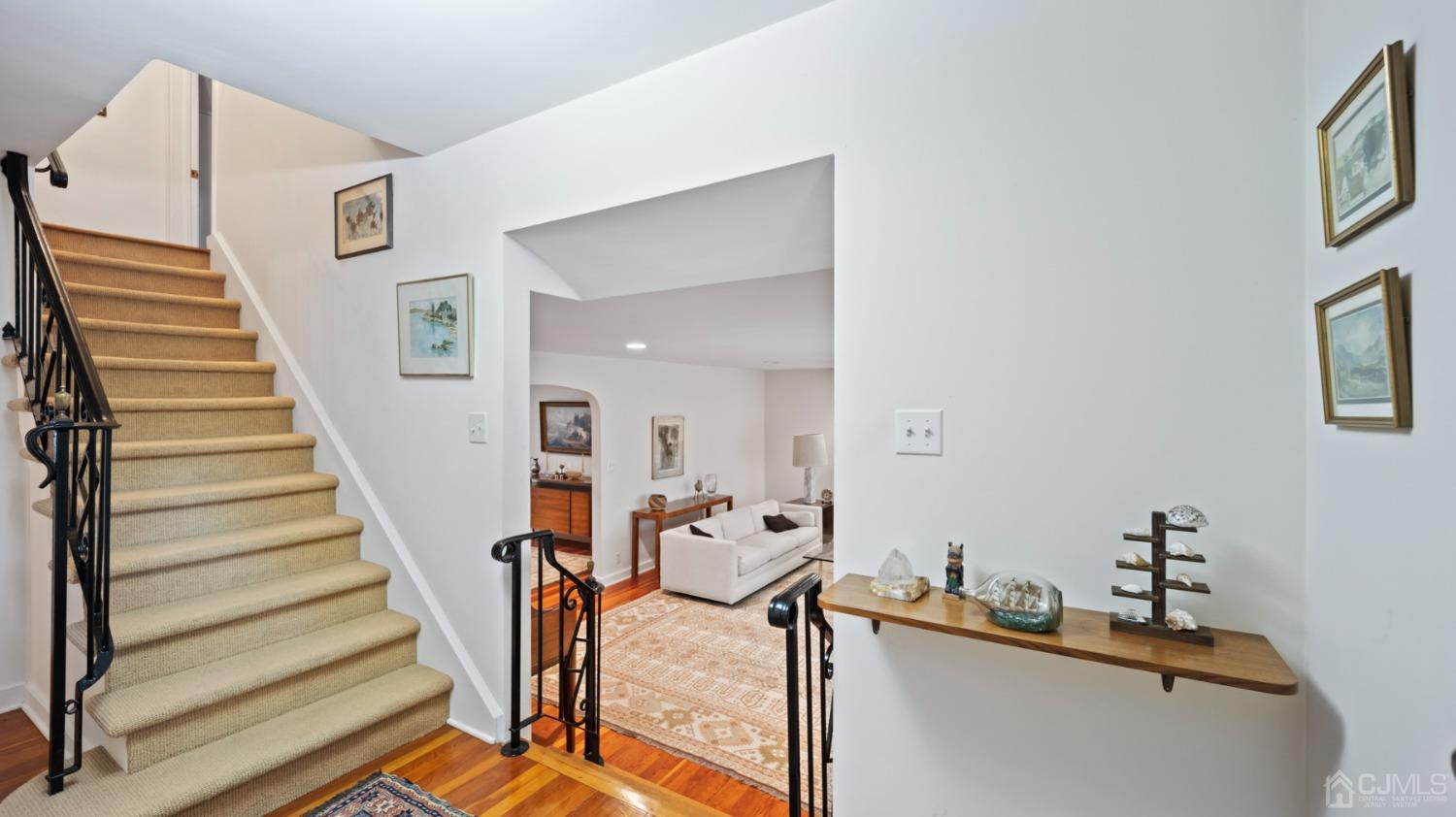 2 Beech Lane Edison, NJ 08820 - Photo 18 of 33 a view of entryway and hall with wooden floor
