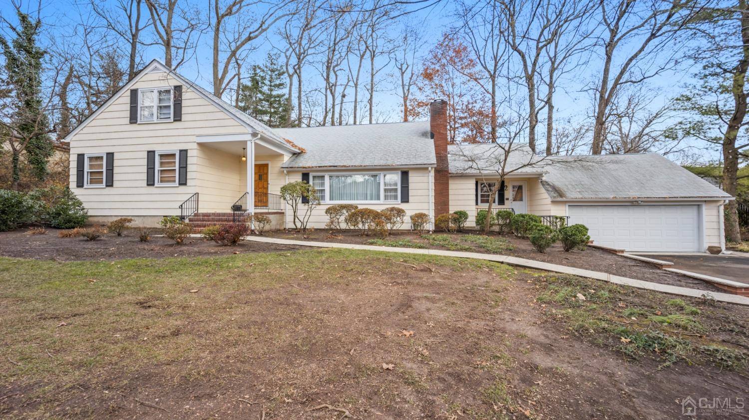 2 Beech Lane Edison, NJ 08820 - Photo 2 of 33 a front view of a house with a yard
