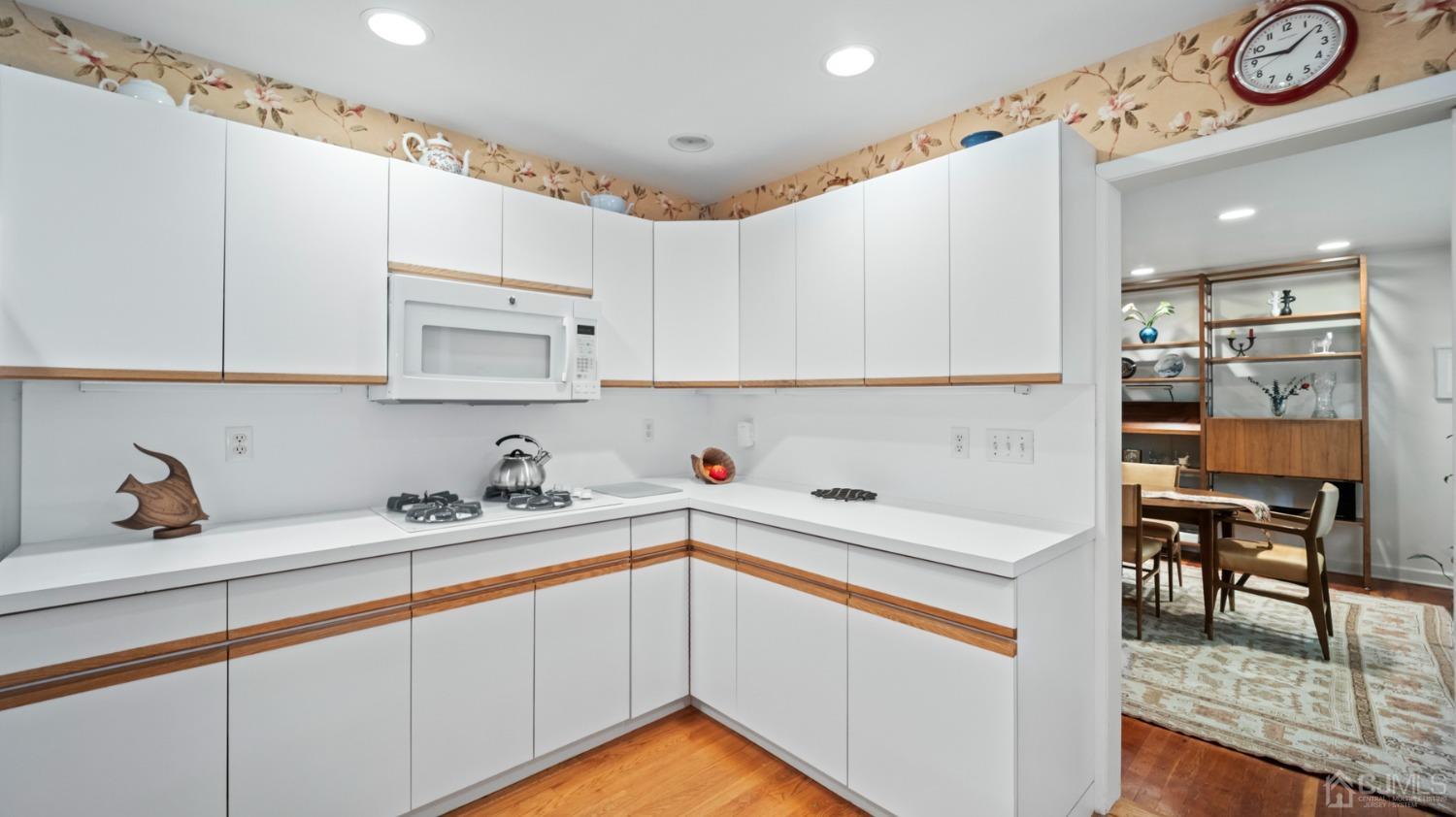 2 Beech Lane Edison, NJ 08820 - Photo 8 of 33 a kitchen with stainless steel appliances granite countertop a sink and cabinets
