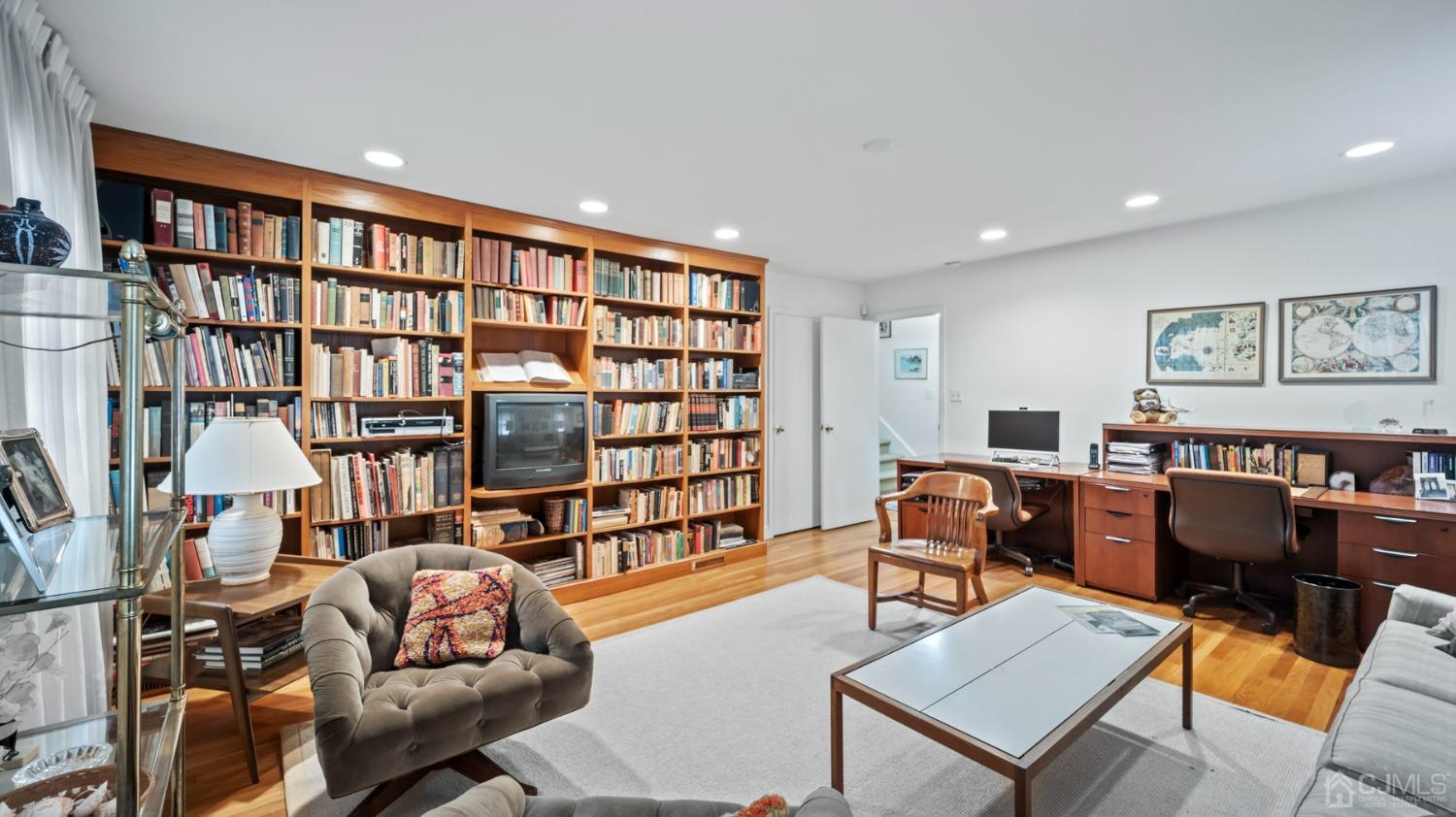 2 Beech Lane Edison, NJ 08820 - Photo 9 of 33 a living room with furniture and a book shelf