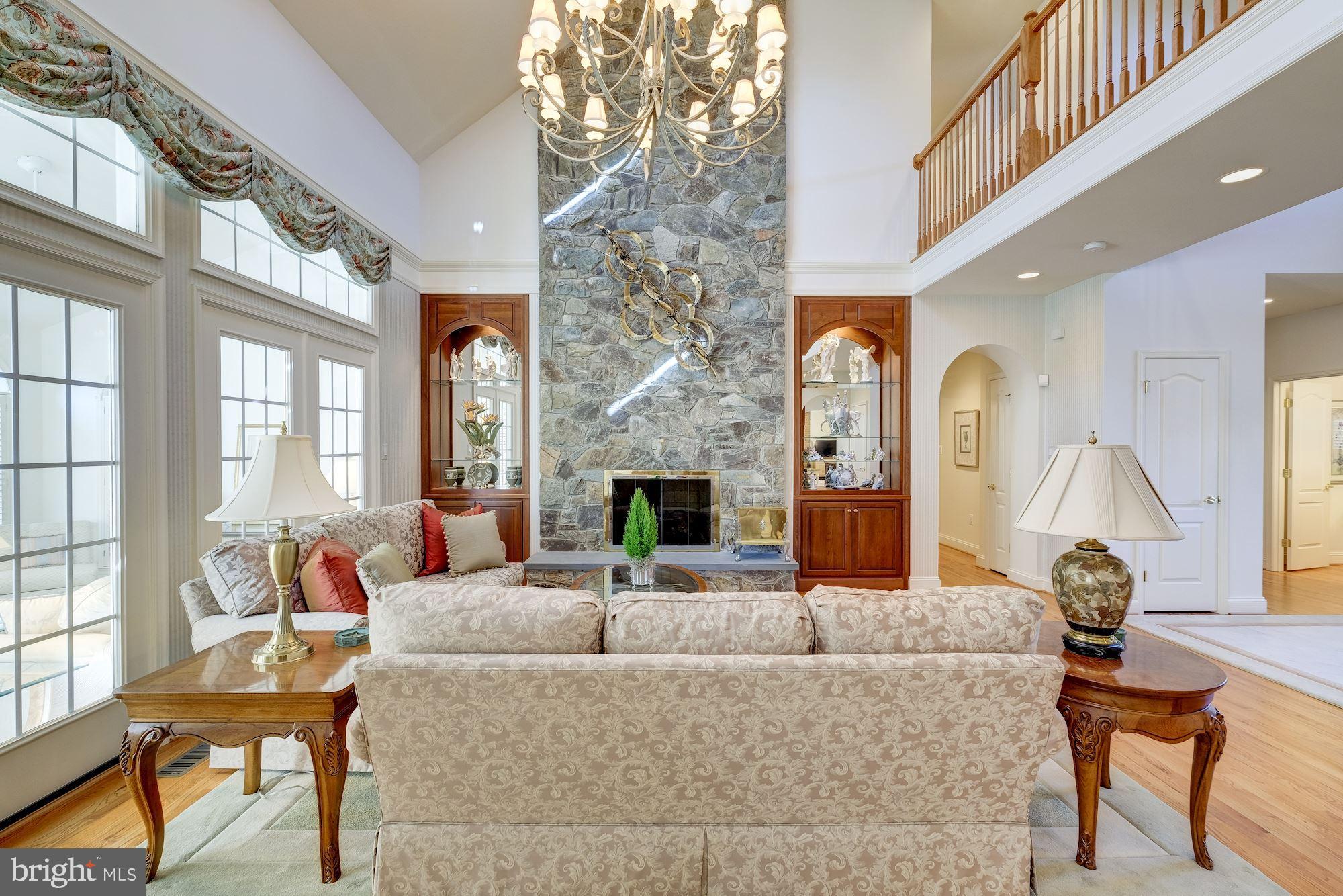 2669 Brook Valley Road Frederick, MD 21701 - Photo 9 of 70 CUSTOM DESIGNED FLOOR-TO-CEILING STONE FIREPLACE!