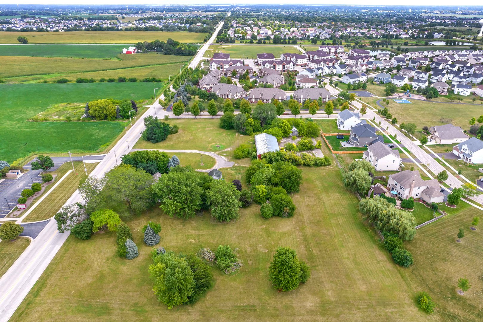 870 Simons Road Plainfield, IL 60585 - Photo 8 of 14 an aerial view of a residential houses with outdoor space and lake view