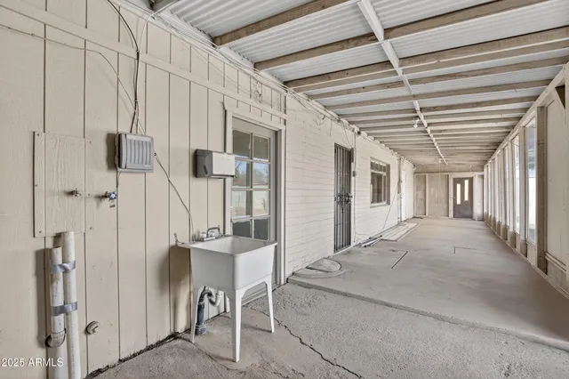 a view of a room with sliding glass door