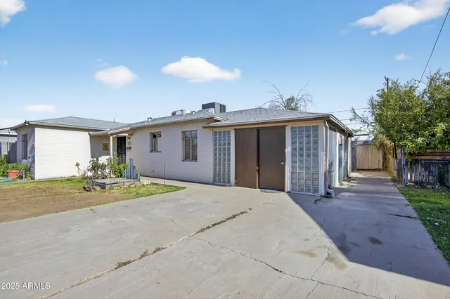 a view of a house with a swimming pool
