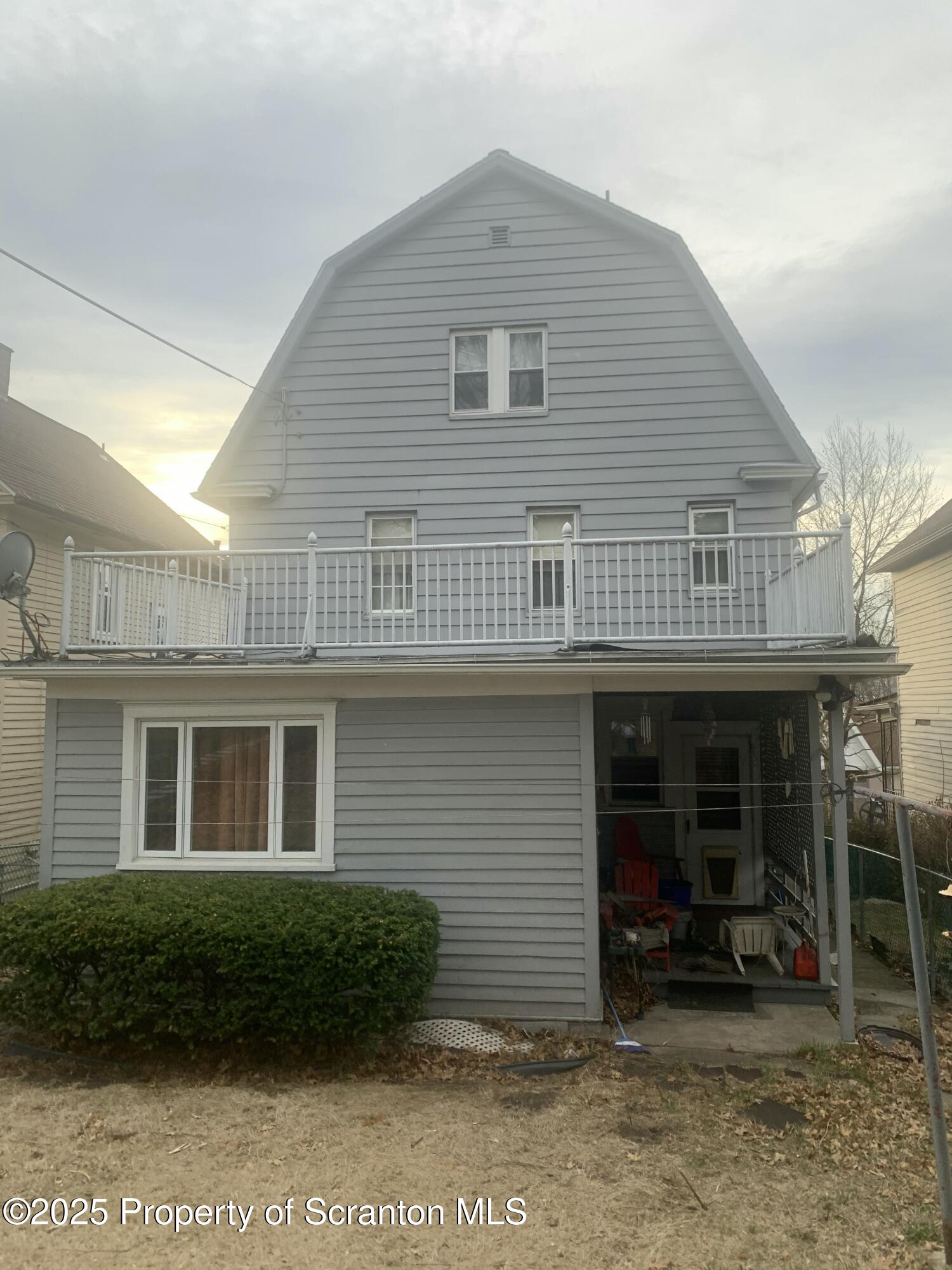 1018 Madison Avenue Scranton, PA 18510 - Photo 2 of 13 a view of a house with a yard and sitting area