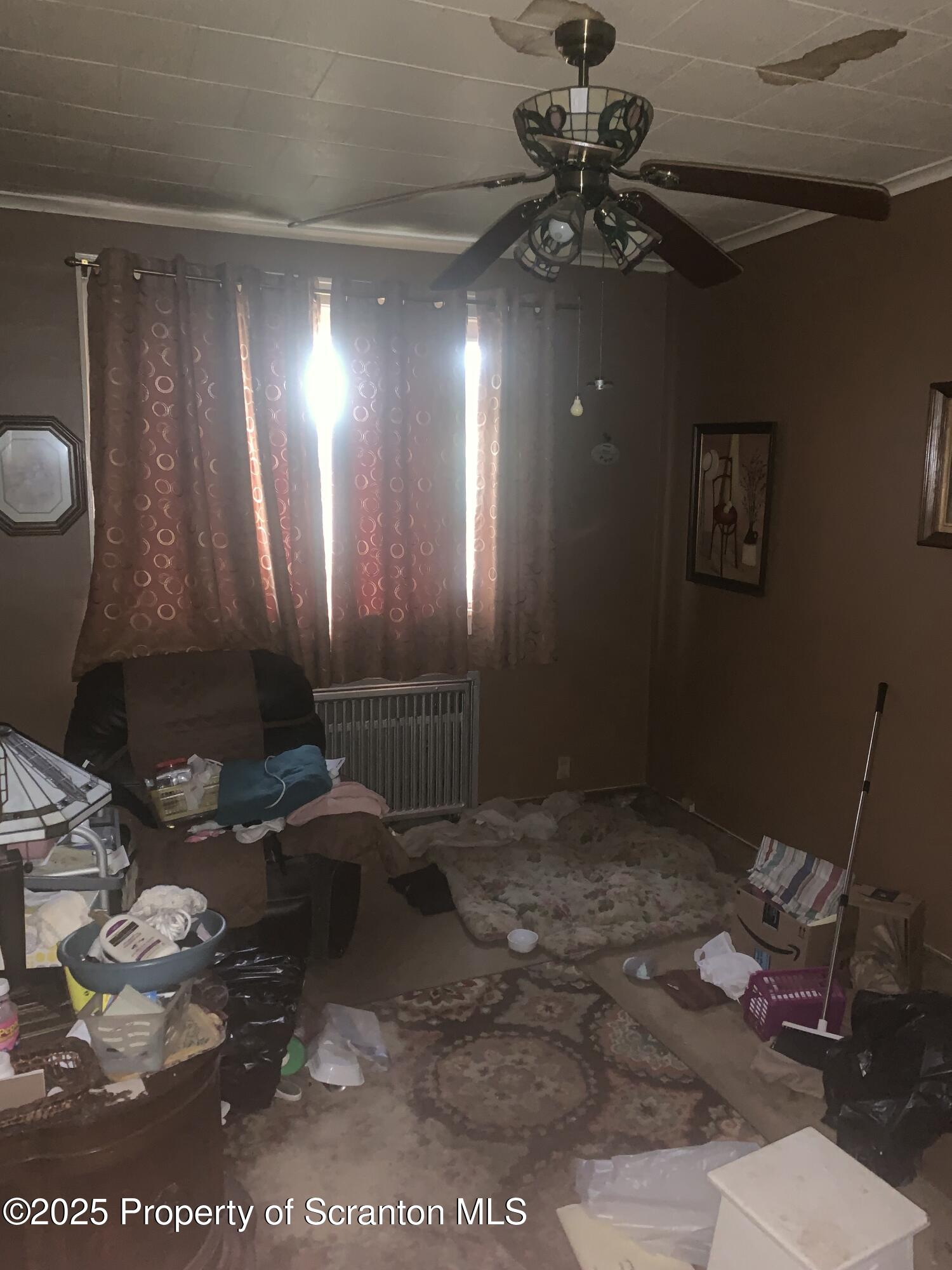 1018 Madison Avenue Scranton, PA 18510 - Photo 7 of 13 a bathroom with a sink and a mirror