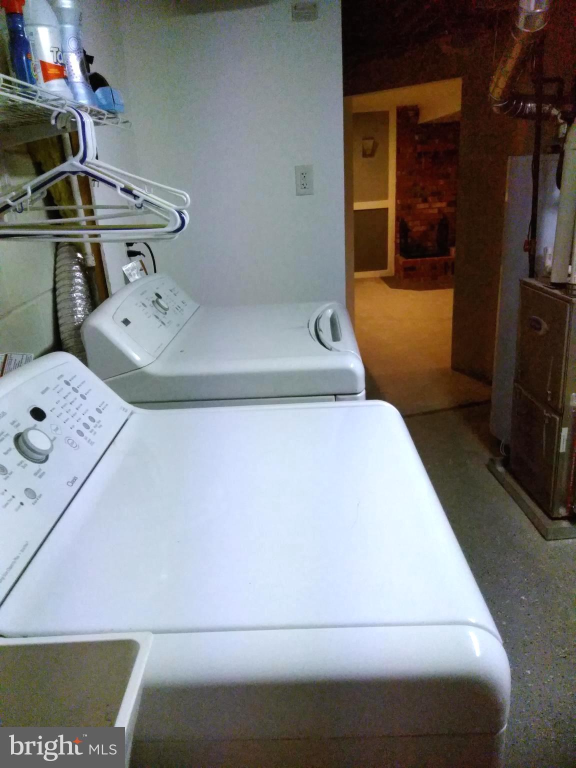 1806 Ridgewick Road Glen Burnie, MD 21061 - Photo 20 of 25 Storage Room with Laundry, Utility Sink Shelves