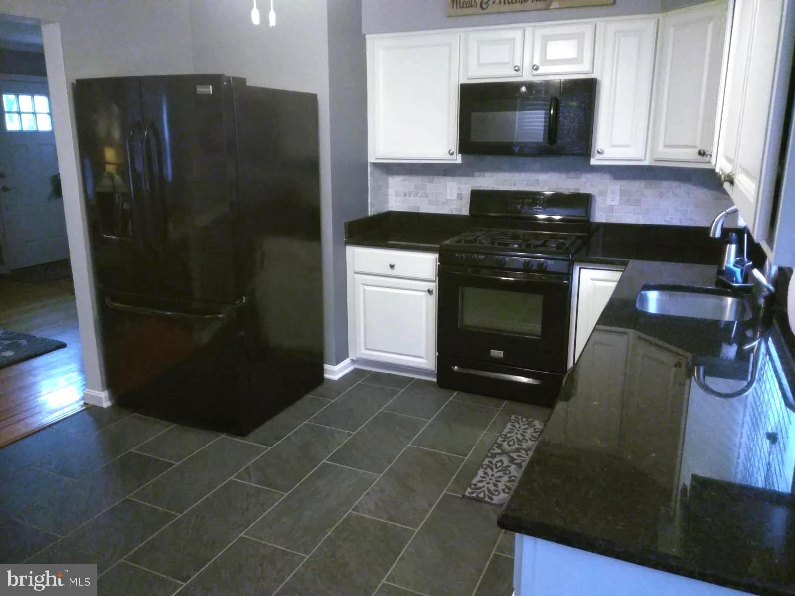 1806 Ridgewick Road Glen Burnie, MD 21061 - Photo 7 of 25 Kitchen Granite, New Tile Floors Updated Appliance