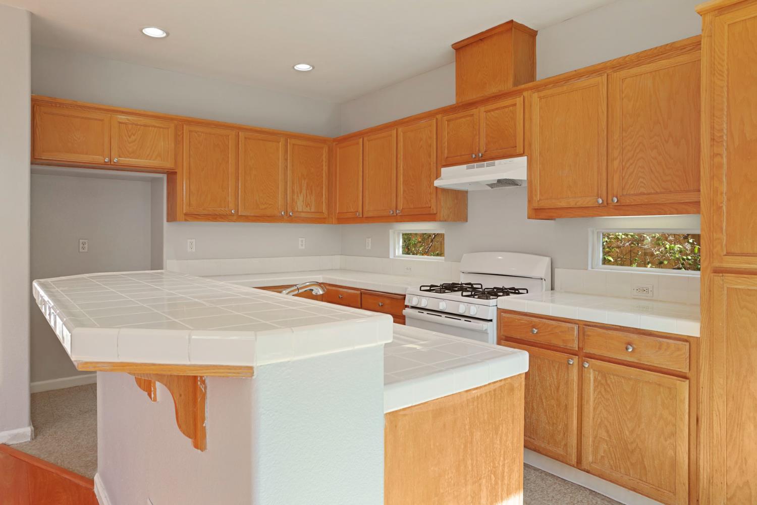 2902 Campbell Lane Tracy, CA 95377 - Photo 14 of 29 a kitchen with a sink a stove and a microwave