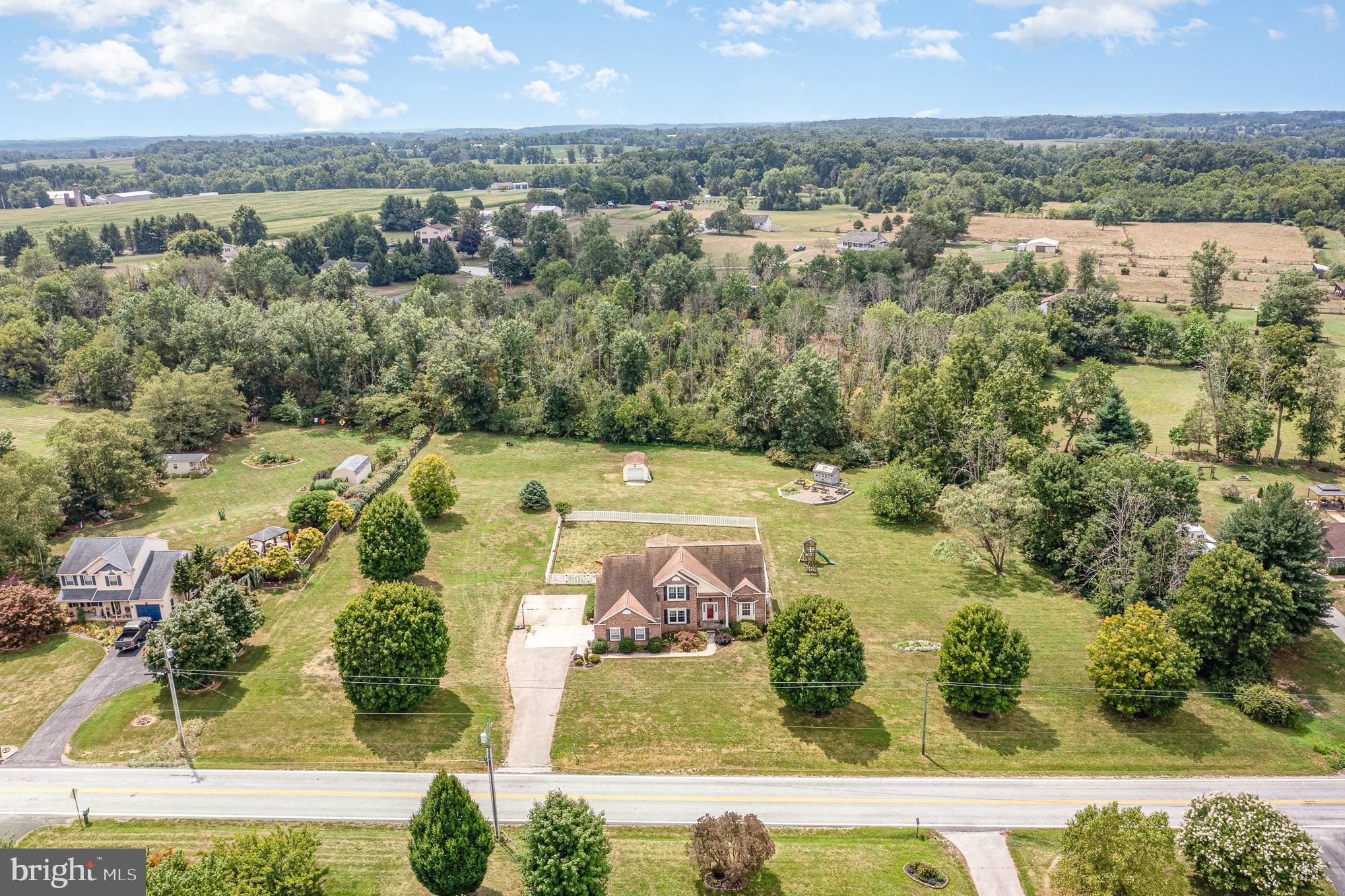 1385 Harney Road Littlestown, PA 17340 - Photo 54 of 58 an aerial view of a residential houses with outdoor space and street view