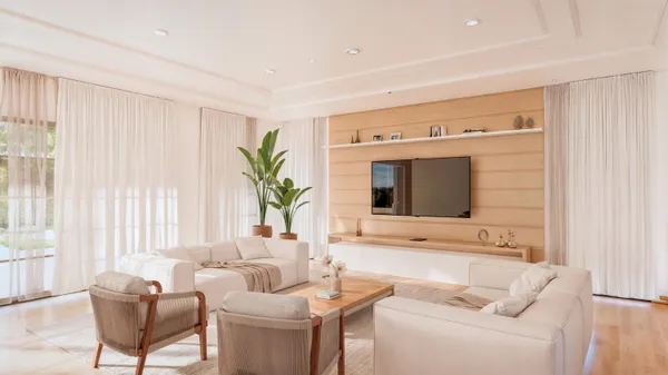 a living room with furniture and a flat screen tv