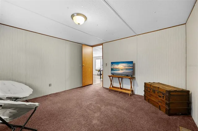 a living room with furniture and a area