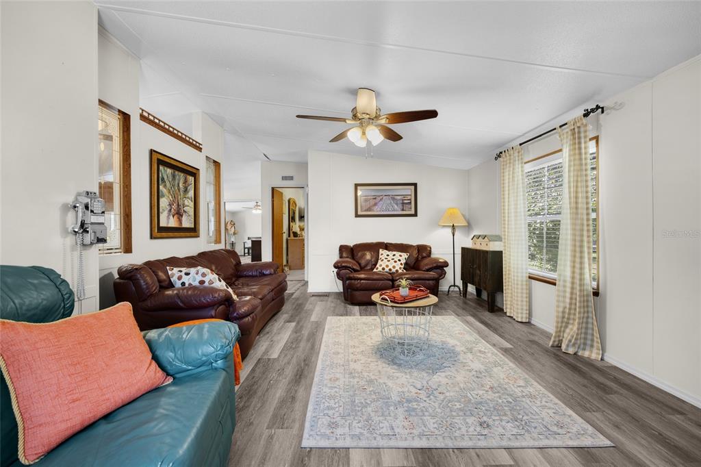 3639 Northeast 80th Avenue High Springs, FL 32643 - Photo 4 of 35 a living room with furniture fireplace and a window
