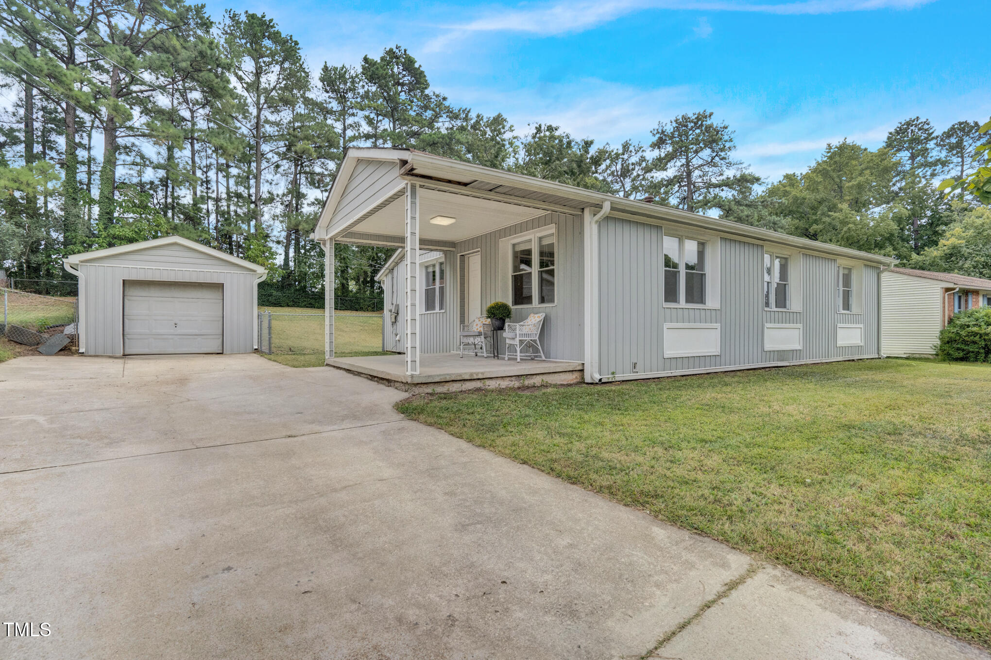 3312 Apache Drive Raleigh, NC 27609 - Photo 2 of 12 a view of a house with backyard and garden