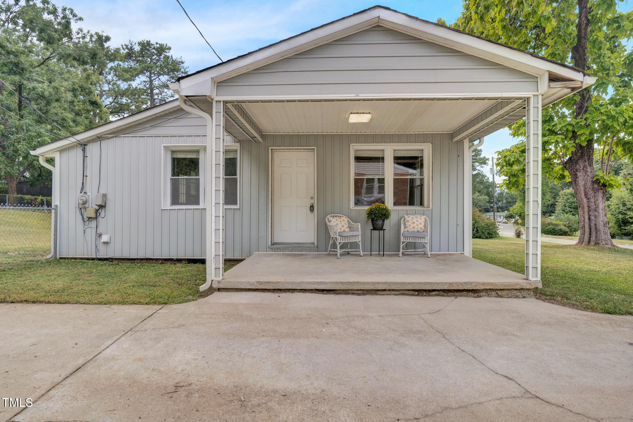 3312 Apache Drive Raleigh, NC 27609 - Photo 4 of 12 a view of a house with porch and garden