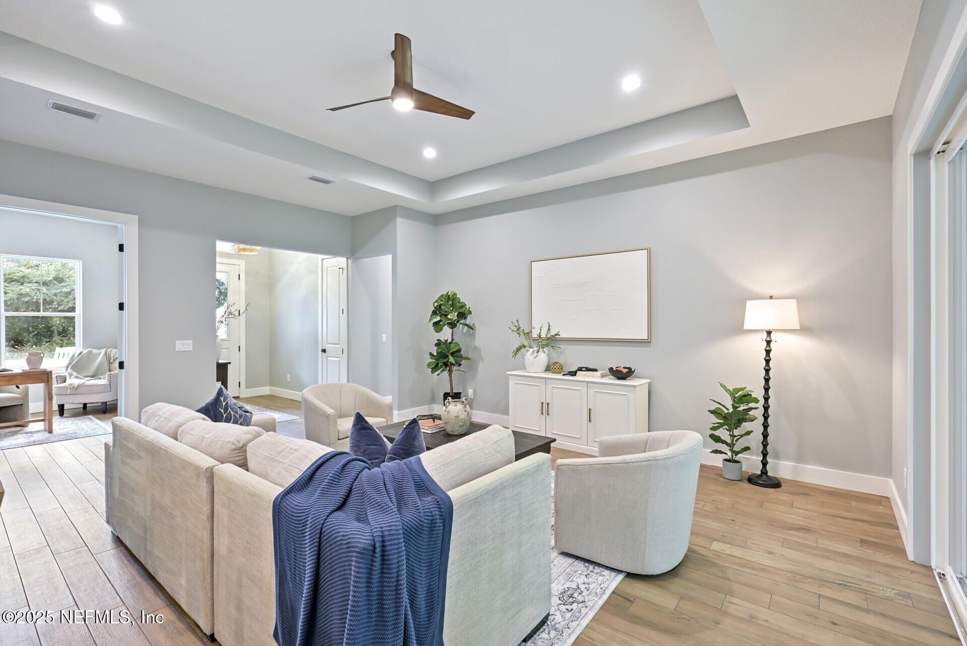4435 Julington Creek Road Jacksonville, FL 32258 - Photo 13 of 64 a living room with furniture and a wooden floor