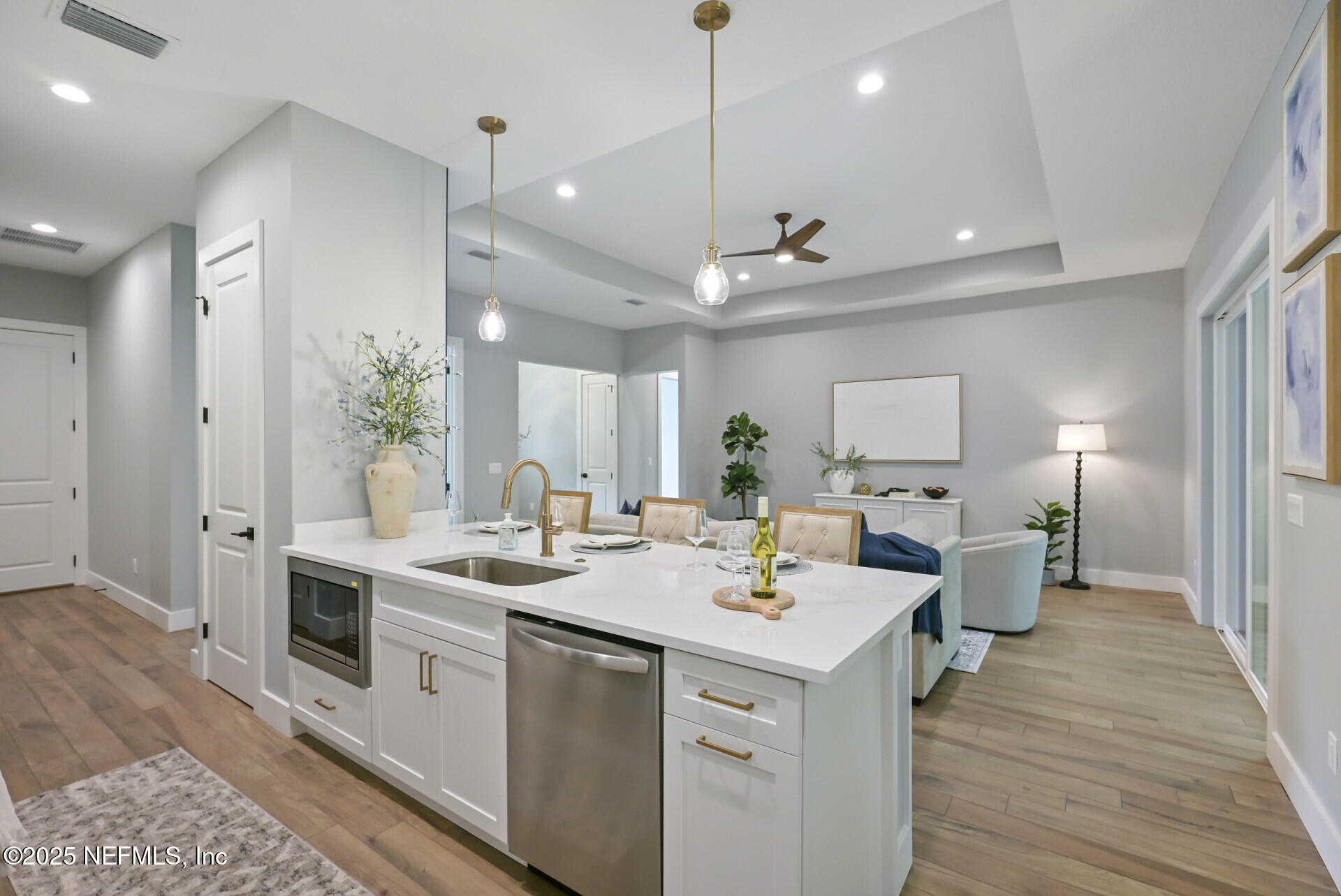 4435 Julington Creek Road Jacksonville, FL 32258 - Photo 21 of 64 a kitchen with a sink stainless steel appliances a window and a counter top space