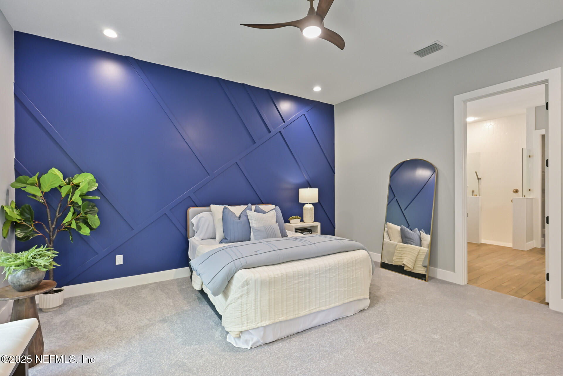 4435 Julington Creek Road Jacksonville, FL 32258 - Photo 23 of 64 a bedroom with a bed and a potted plant