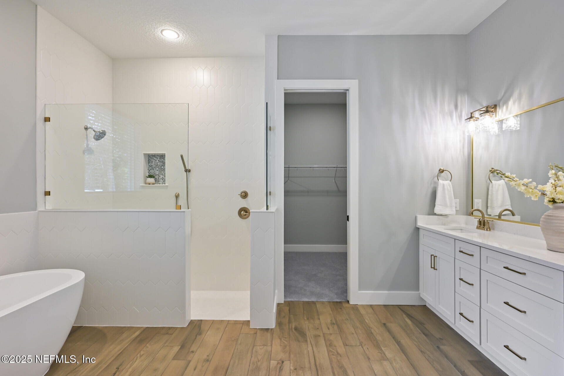 4435 Julington Creek Road Jacksonville, FL 32258 - Photo 26 of 64 a bathroom with a sink a toilet and shower