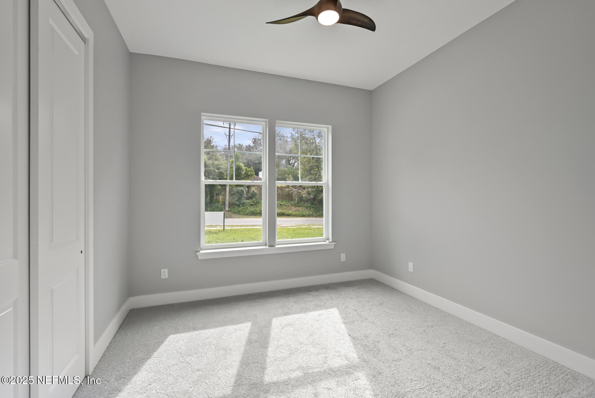 4435 Julington Creek Road Jacksonville, FL 32258 - Photo 32 of 64 an empty room with a window