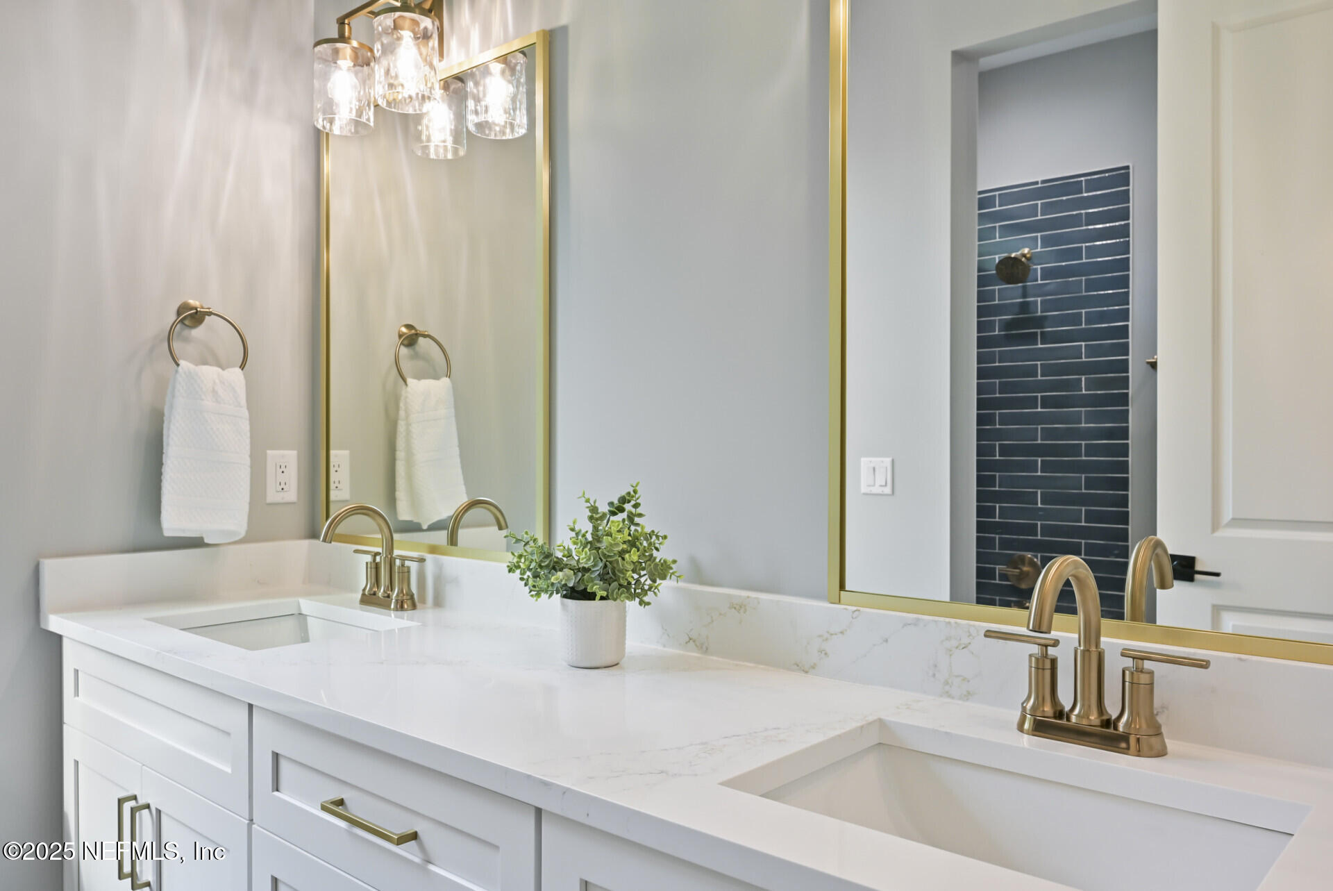 4435 Julington Creek Road Jacksonville, FL 32258 - Photo 35 of 64 a bathroom with a sink a vanity and a mirror