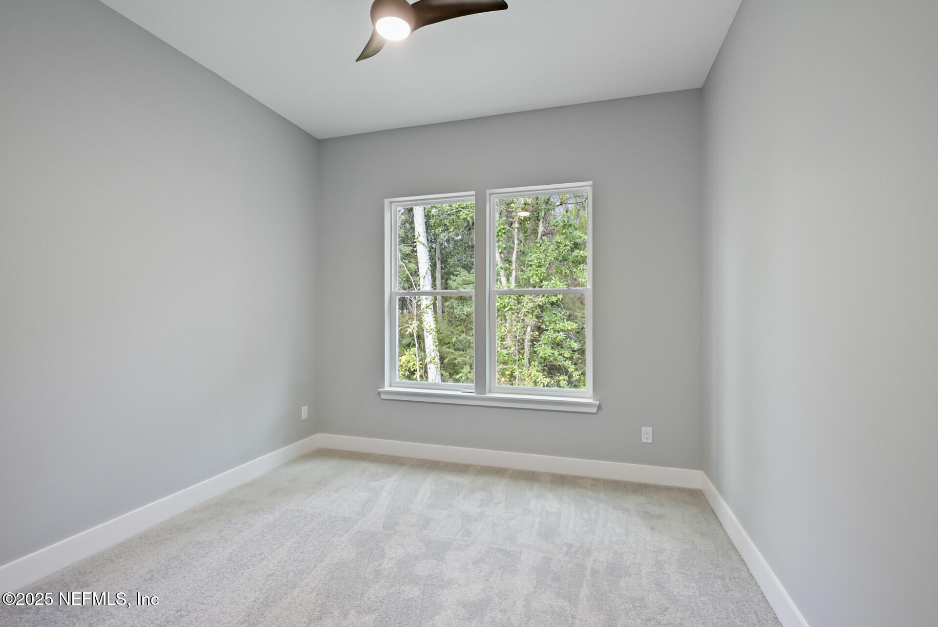 4435 Julington Creek Road Jacksonville, FL 32258 - Photo 37 of 64 an empty room with windows