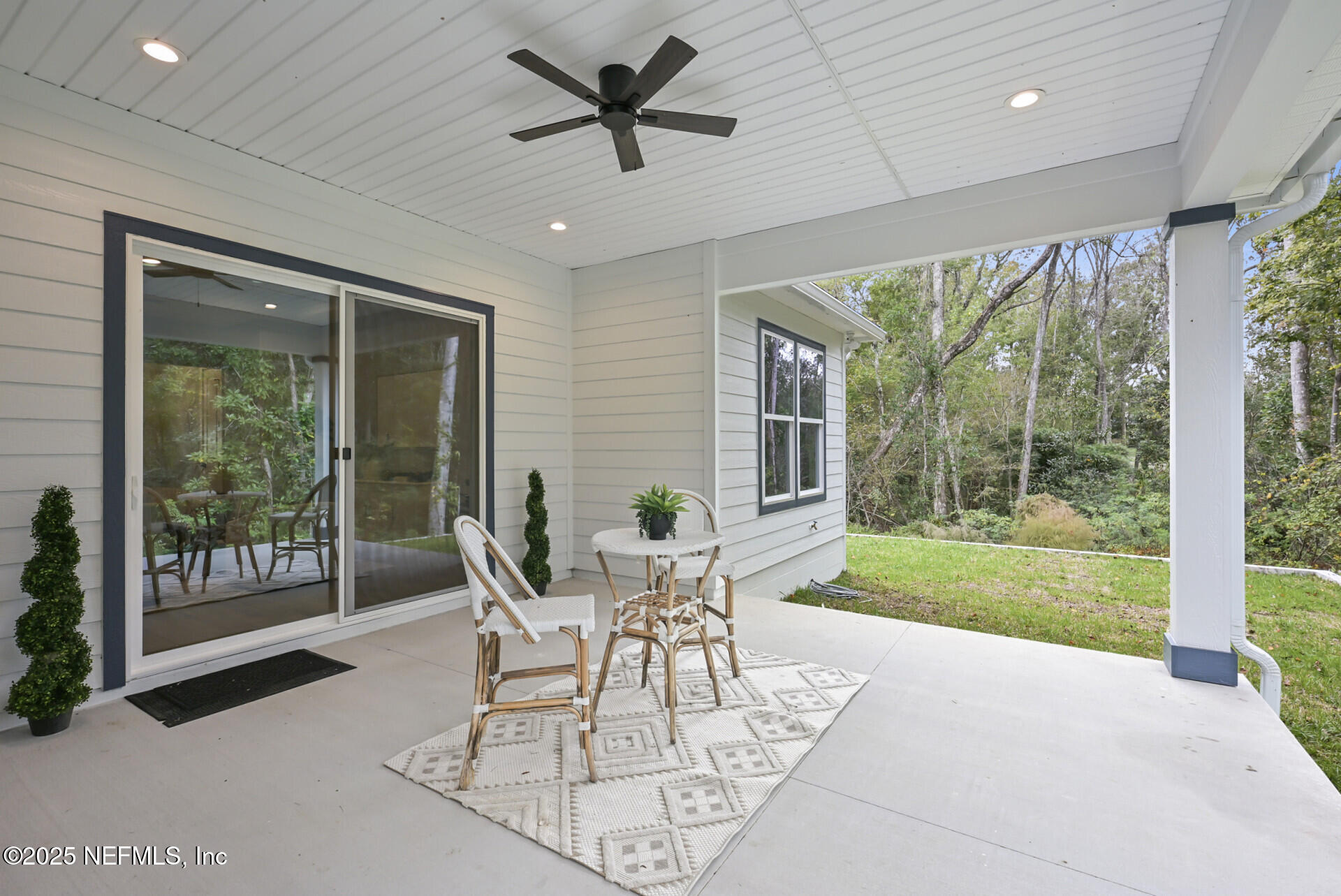 4435 Julington Creek Road Jacksonville, FL 32258 - Photo 43 of 64 a view of a living room and a porch