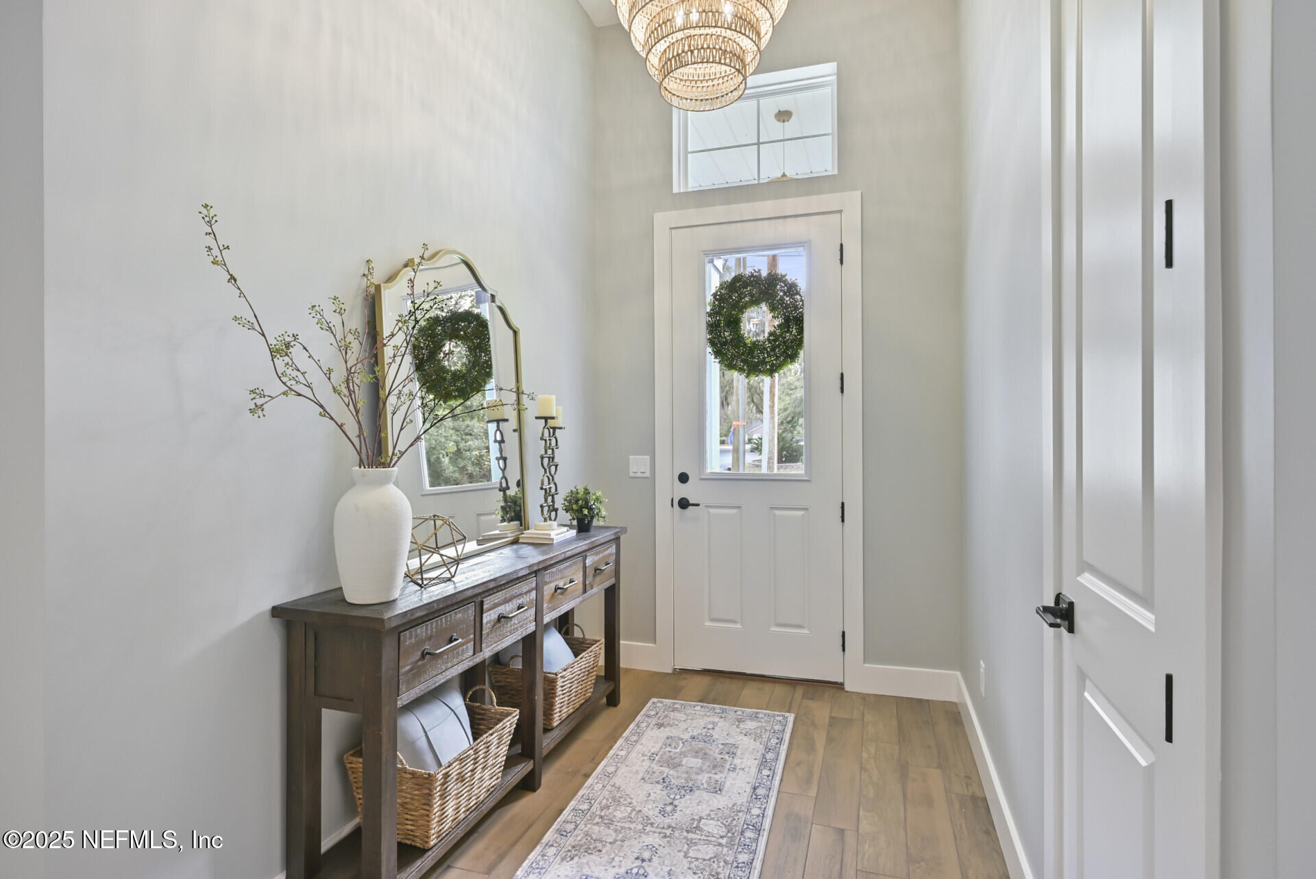 4435 Julington Creek Road Jacksonville, FL 32258 - Photo 6 of 64 a view of an entryway with wooden floor