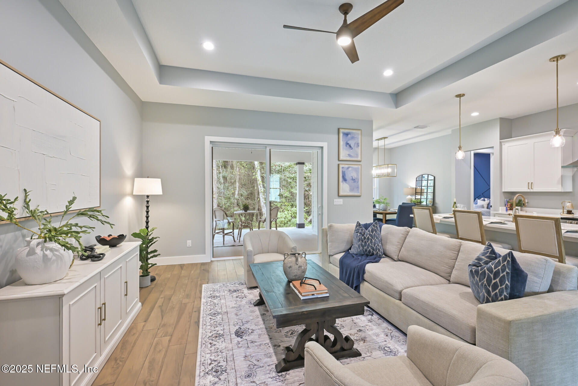 4435 Julington Creek Road Jacksonville, FL 32258 - Photo 8 of 64 a living room with furniture and a large window