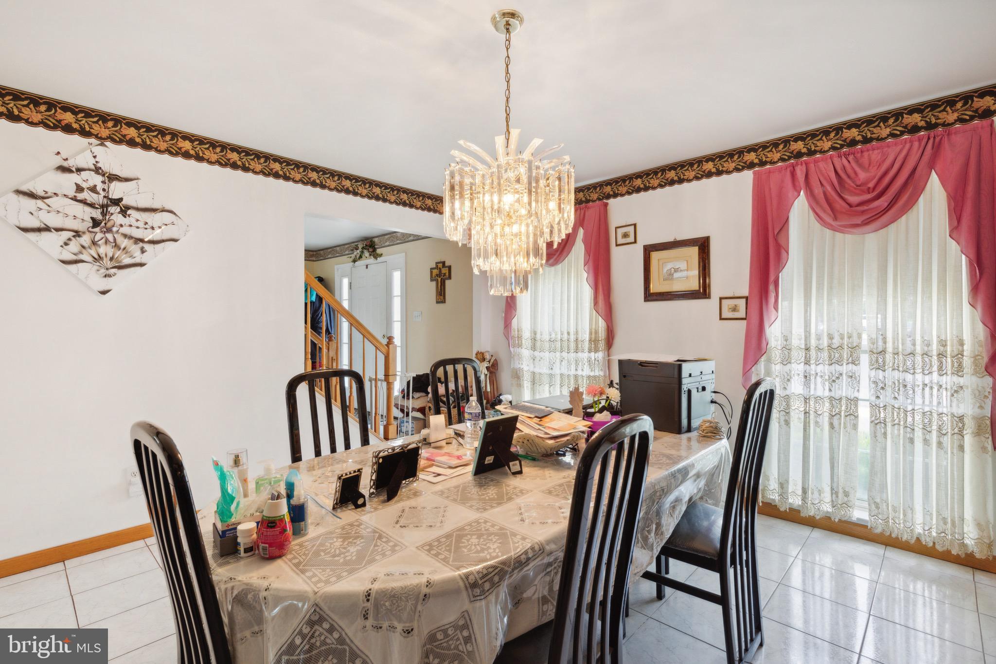 38 Cherry Tree Court Spring City, PA 19475 - Photo 11 of 35 a view of a dining room with furniture window and wooden floor