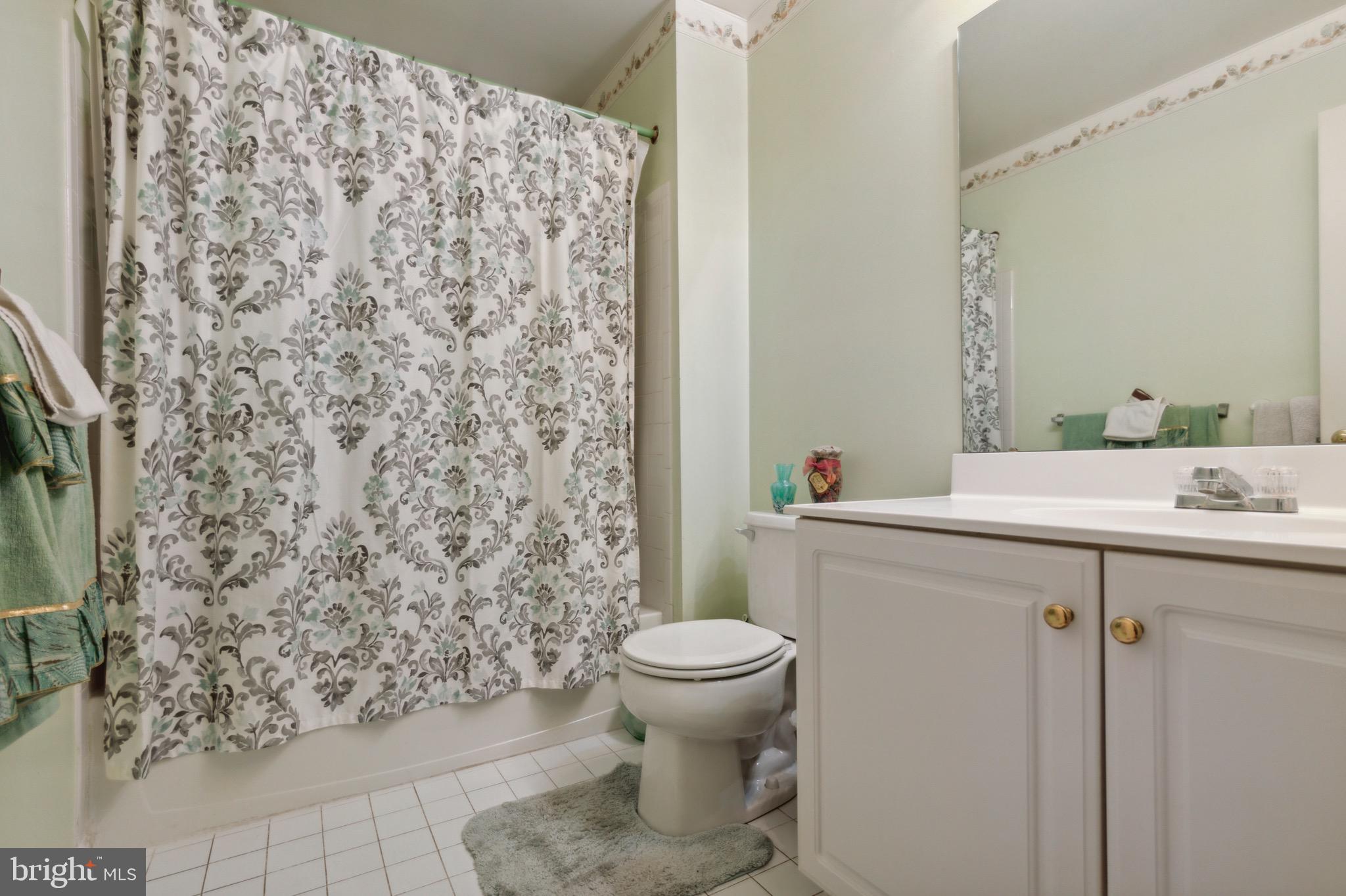 38 Cherry Tree Court Spring City, PA 19475 - Photo 20 of 35 a bathroom with a sink toilet and a mirror